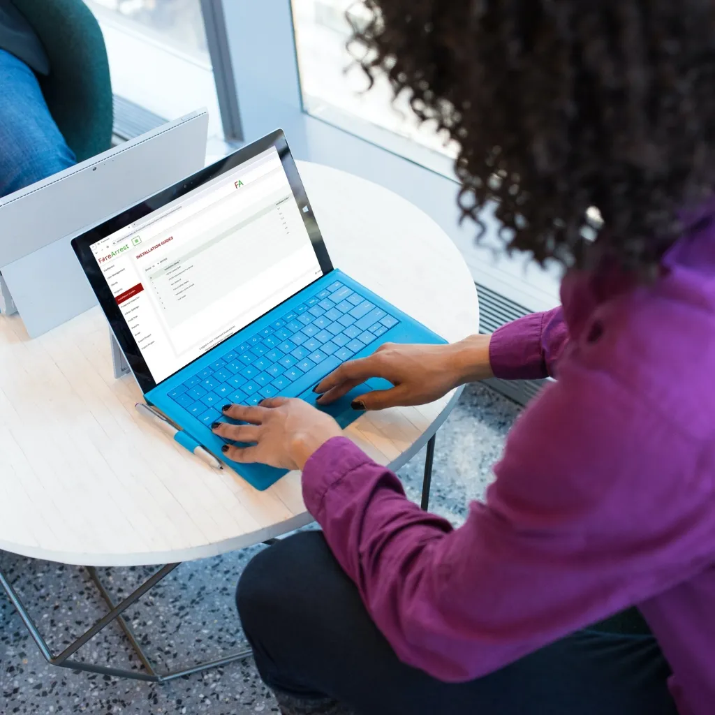 Lady Using FireArrest on Laptop